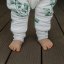 Detský eshop - Celoroční spací pytel s nohavicemi Sleepee Eukalyptus/Černé tečky S