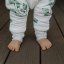 Detský eshop - Celoroční spací pytel s nohavicemi Sleepee Bloom/Černé tečky M